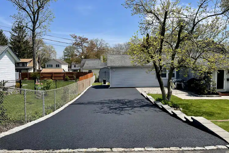 Fresh residential asphalt driveway